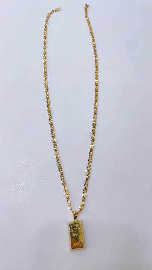 Byzantine-style necklace with a gold bar replica pendant.

Crafted entirely in 18kt gold.

Length: 50 cm
Total weight: 7.3 g