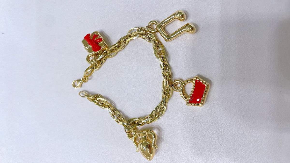 Bracciale a catena con charme in oro 18 kt - dettaglio 1