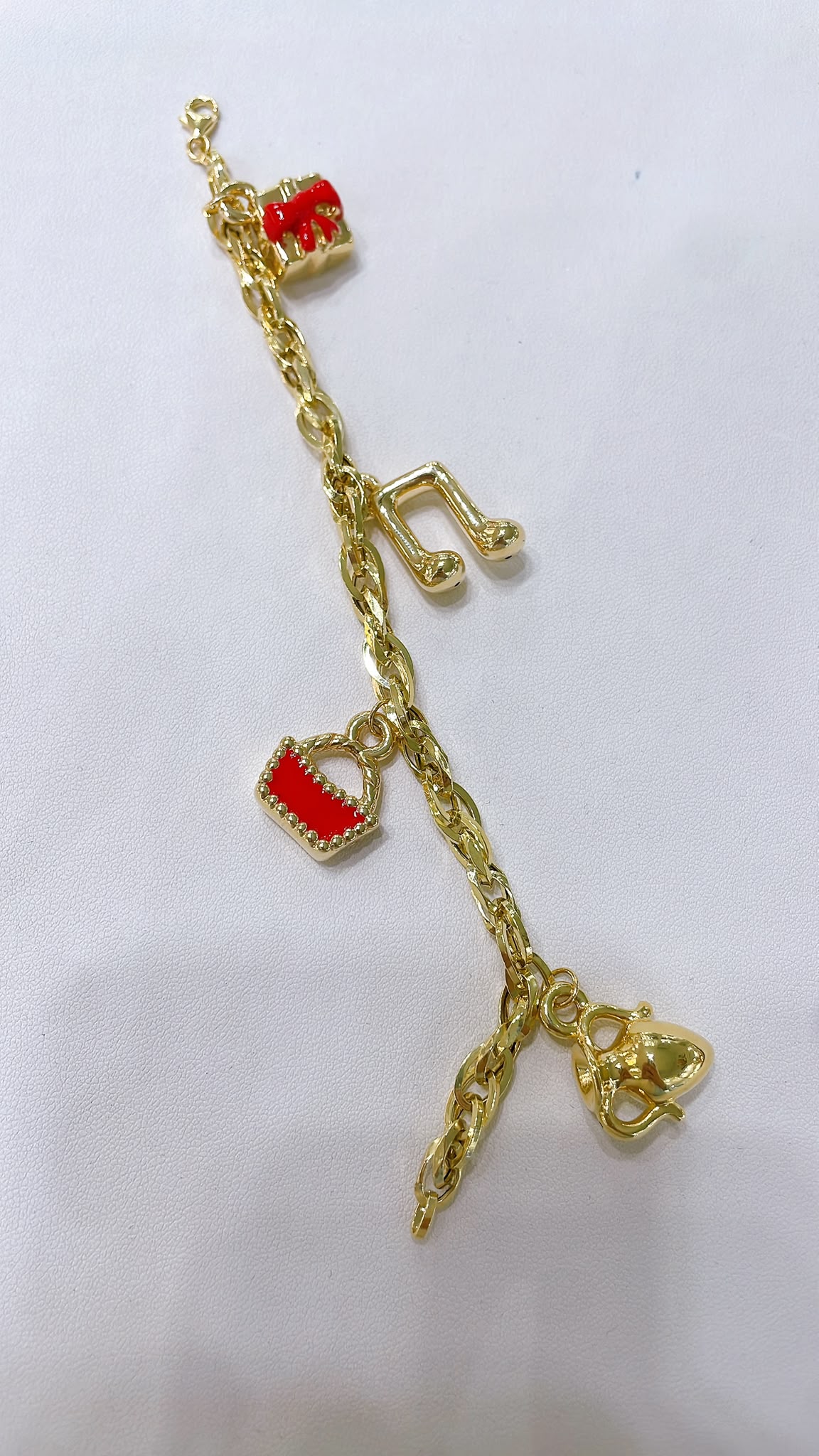 Bracciale a catena con charme in oro 18 kt - dettaglio 2