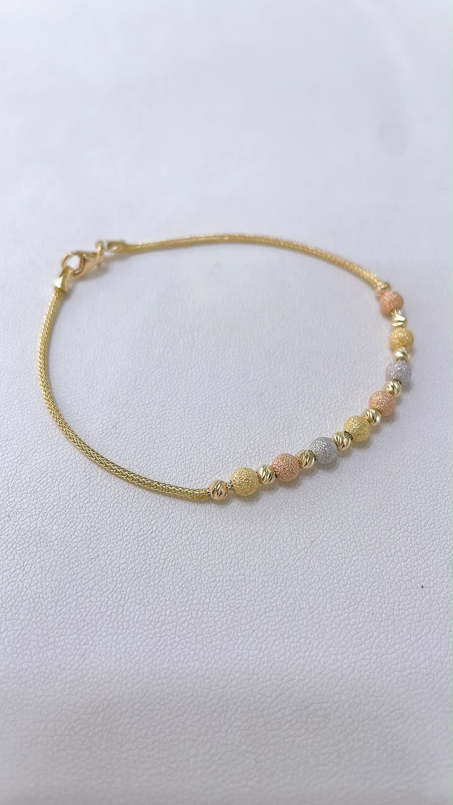 Bracciale Milleluci tricolore in oro 18K